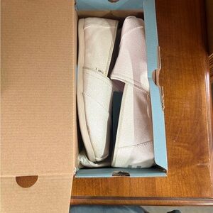 TOMS Off-White Canvas Slip-Ons